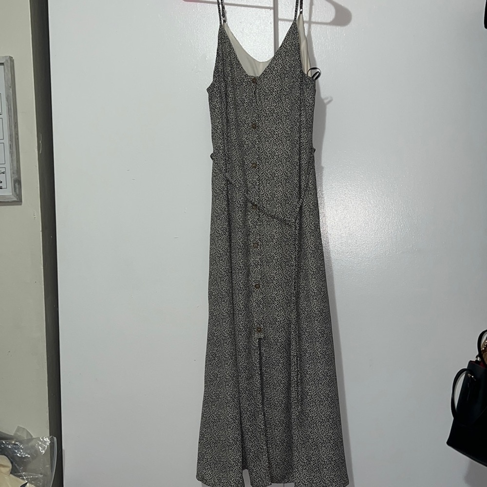 I’m Selling a dress from Marshall’s in a size large. It has a slit in the front.